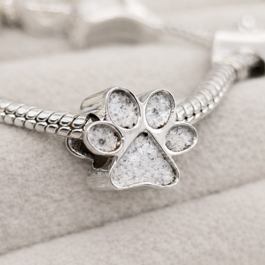 Paw print  Charm  in Sterling Silver