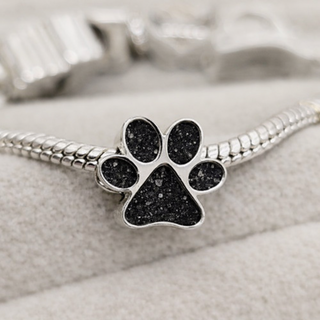Paw print  Charm  in Sterling Silver